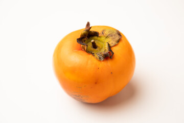 Wall Mural - Persimmon fruit on white background