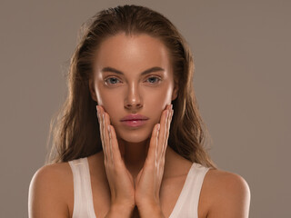 Wall Mural - beautiful woman face with healthy clean slon spa concept cosmetic skin care