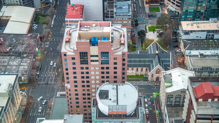 Wall Mural - AUCKLAND, NZ - AUGUST 26, 2018: Aerial city view from Sky Tower. Auckland skyline at sunset