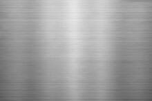 Silver Metal Texture Of Brushed Stainless Steel Plate With The Reflection Of Light.