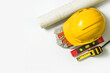 Blueprint Yellow safety helmet for construction and tools on white background.