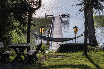 Sticker - Small pier on Narie lake of Ilawa Lake District in Kretowiny, small village in Warmia Mazury region of Poland