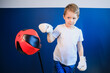 Young boy Boxing at home during self-isolation.