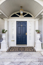 Entrance To The House With A Dark Blue Front Door