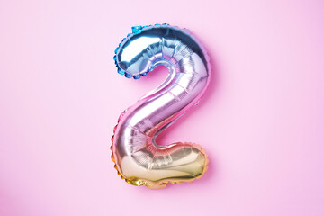 creative layout. rainbow foil balloon number and digit two 2. birthday greeting card. anniversary co