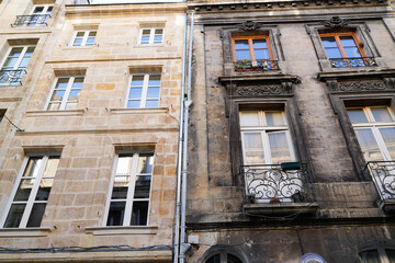 Wall Mural - before and after comparison of clean building facades with difference between two house facade