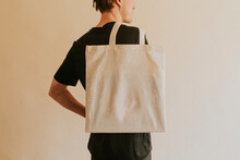 Back View Man Carrying Tote Bag