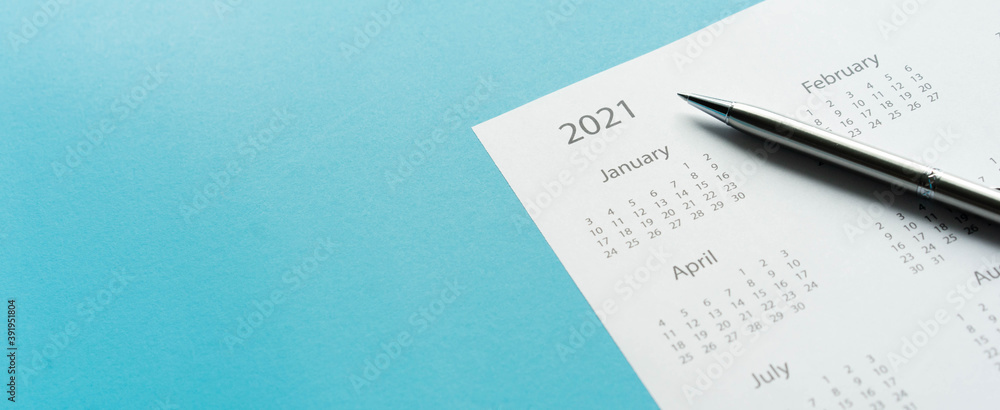 close up top view on white calendar 2021 schedule with pen on blue color background to make appointment meeting or manage timetable each day for design planning work and life concept - obrazy, fototapety, plakaty 