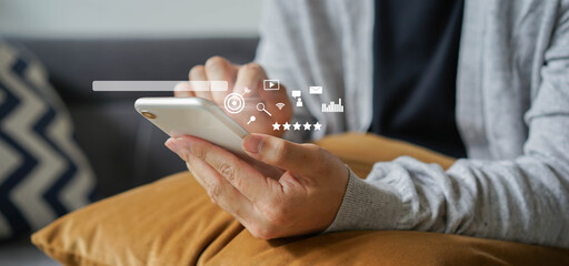 Wall Mural - close up man hand touchscreen on smartphone to use search engine optimization (seo) tools for find c