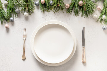 Wall Mural - Christmas table setting with white holiday elegant decorations on white table. View from above.