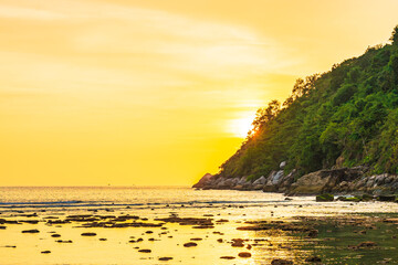 Wall Mural - Beautiful sunset over mountain around beach sea ocean