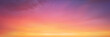 Leinwandbild Motiv panorama of cloudscape at sunset with vivid and dreamy colors on sky