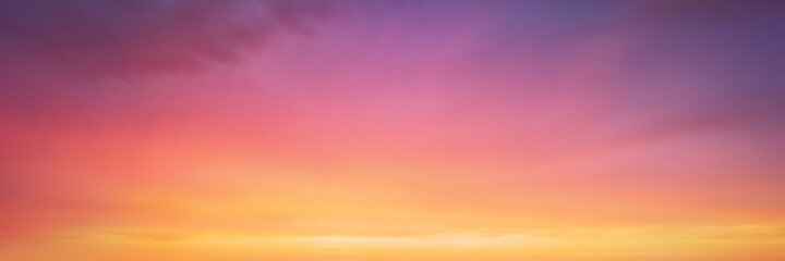 panorama of cloudscape at sunset with vivid and dreamy colors on sky