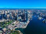 Fototapeta  - Panoramic Aerial views of Sydney Harbour with the bridge, CBD, North Sydney, Barangaroo, Lavender Bay and boats in view