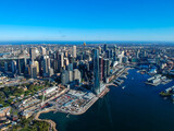 Fototapeta Miasta - Panoramic Aerial views of Sydney Harbour with the bridge, CBD, North Sydney, Barangaroo, Lavender Bay and boats in view