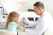© Pixel-Shot - Doctor giving diabetic girl insulin injection in clinic