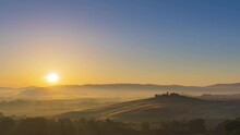 4K Panning Timelapse Sunrise Over The Rolling Hills In Tuscany Countryside, Italy
