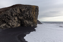 Basalt Rock Formations On Icelandic Black-sand Beach