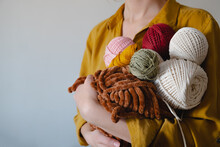 Rolls Of Cotton Ropes In Woman Hand. Knitting, Crocheting, Handm