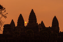 Angkor Wat, Siem Reap, Cambodia. Sunrise From Reflection Pool Showing 5 Towers Of Main Temple.