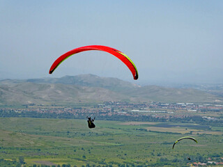 Paragliders flying fromBrestovitsa in Bulgaria	