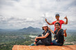 © Cavan Images - three friends on top of the rock fortress of Sigiriya