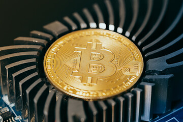 Wall Mural - Gold bitcoin and new virtual money for the electronic processor. Cryptocurrency concept.
