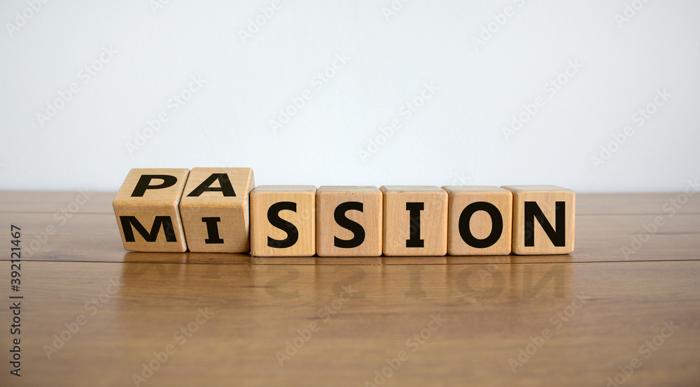 Do your mission with passion. Fliped wooden cubes and changed the inscription 'mission' to 'passion' or vice versa. Beautiful wooden table, white background, copy space. - obrazy, fototapety, plakaty 