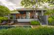 © Mongkolchon - exterior of beach front bungalow for rent of seaside resort and hotel