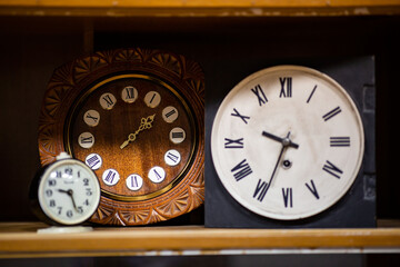 Old wooden clocks on the table