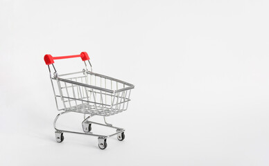 Mini shopping cart isolated on a white background