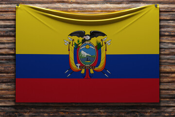 Wall Mural - 3D illustration of the national   fabric flag of Ecuador nailed on a wooden wall .Country symbol.