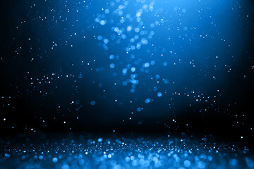 Wall Mural - abstract bokeh on dark blue background. holiday concept