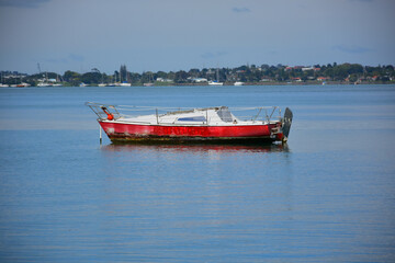 Poster - AUCKLAND, NEW ZEALAND - Nov 02, 2020: small sail boat moored in Tamaki river