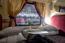 Classic Interior Of Sleeping Car Of Train. Interior Of Compartment Car. Passenger Train Car. Sleeping Car Of Passenger Train.