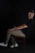 © Bogdan - Funny guy posing on black background. Isolated