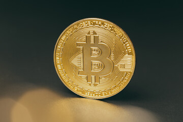 Wall Mural - Bitcoins and new virtual money. Gold coin with B.Mining icon or blockchain technology