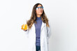 © luismolinero - Young scientific woman isolated on white background and looking up