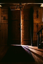 Sunlight Shining Through Door Of Old Church