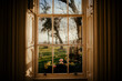 © Chris Zielecki/Stocksy - House window with garden behind