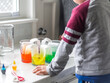 © Amanda Large/Stocksy - Kids STEM experiment with food coloring