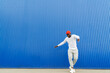 © Hernandez & Sorokina/Stocksy - Black Man Dancing on Blue Wall