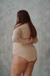 © Tatiana Timofeeva/Stocksy - portrait of a beautiful young Asian woman real body in a swimsuit