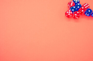 Canvas Print - Top view of red and blue dice isolated on light orange background