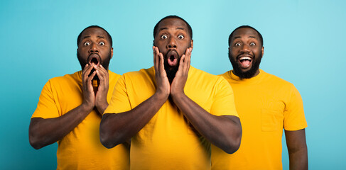 Wall Mural - black man with wondered, surprised and happy expression on cyan background