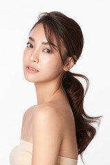 beautiful young asian woman with clean fresh skin on white background, face care, facial treatment, 