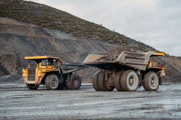 Wall Mural - Movement of dump trucks at the gold mining site.