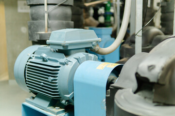 Wall Mural - Factory equipment. Electric motor of pumps