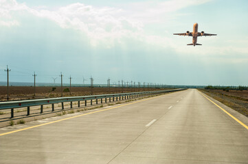 Takeoff of the passenger airplane and the runway outdoors