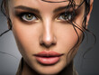 Closeup portrait of a beautiful young woman with brown gkamour makeup. Model looking at camera..
